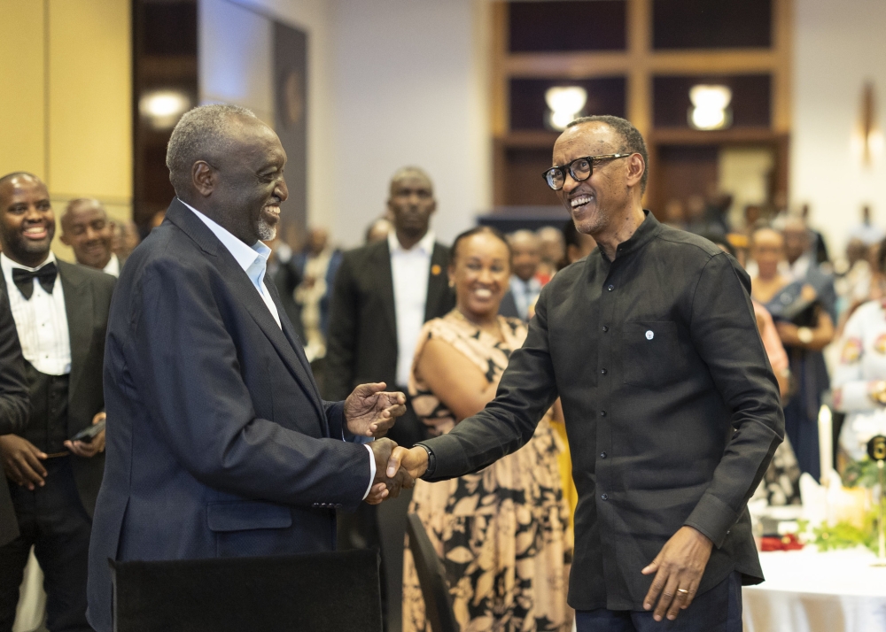 President Paul Kagame and Tito Rutaremara shake hands during the celebration of Rutaremara&#039;s 80th birthday on Saturday, November 23, 2024. Photo by Village Urugwiro