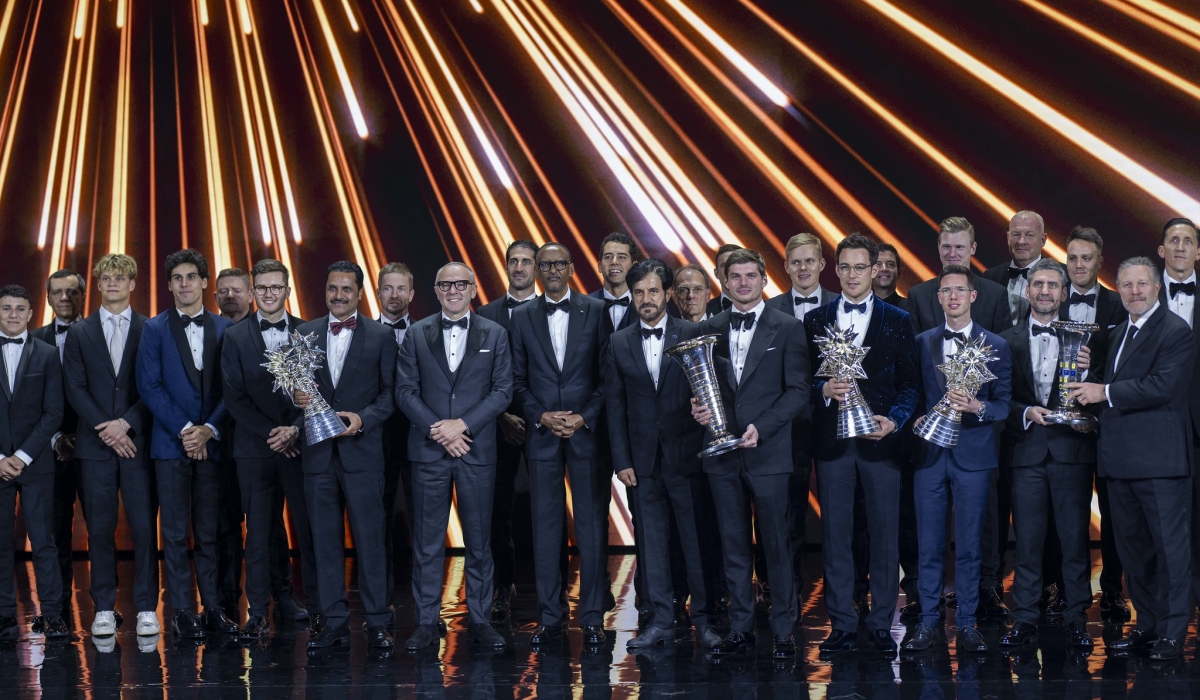 President Paul Kagame and other dignitaries pose for a group photo with awards winners at   the glamorous awards presentation gala at BK Arena on Friday, December 13. Courtesy