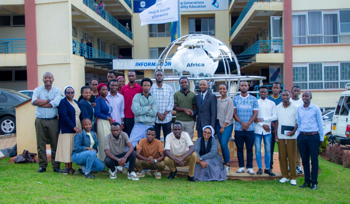 Dr. Martin Kimemia (in a blue suit) is joined by staff and students in bidding farewell to Aubin Byishimo at the Mount Kigali University campus. Courtesy 