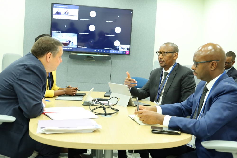 Yusuf Murangwa, the Minister of Finance and Economic Planning and  Central Bank Governor John Rwangombwa during a meeting with IMF representative on the sidelines of the IMF general meeting in New York in October.