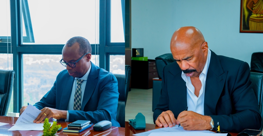  Rwanda Development Board CEO Francis Gatare (L) and American comedian and TV host Steve Harvey sign a partnership agreement in Kigali on Monday, December 16. According to a communique, the agreement centers on skills development in film, media, and education, promoting health campaigns, and establishing an academic institution under Melt Education. Courtesy