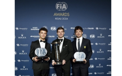 Max Verstappen (C), Lando Norris (L) and Charles Lecrerc (R) pose for a photo with their prizes during the FIA Awards gala at BK Arena on Friday, December 13-photo by FIA.