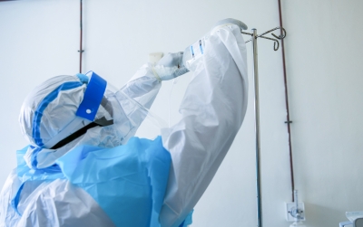 A medic takes care of a patient at King Faisal Hospital. Scientists are increasingly alarmed by the growing threat of zoonotic diseases—infections that jump from animals to humans. File