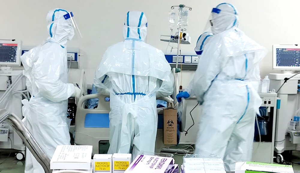 Medics during the Marburg response earlier this year .  Rwanda is expected to declare the end of the Marburg Virus Disease outbreak on Friday, December 20. File