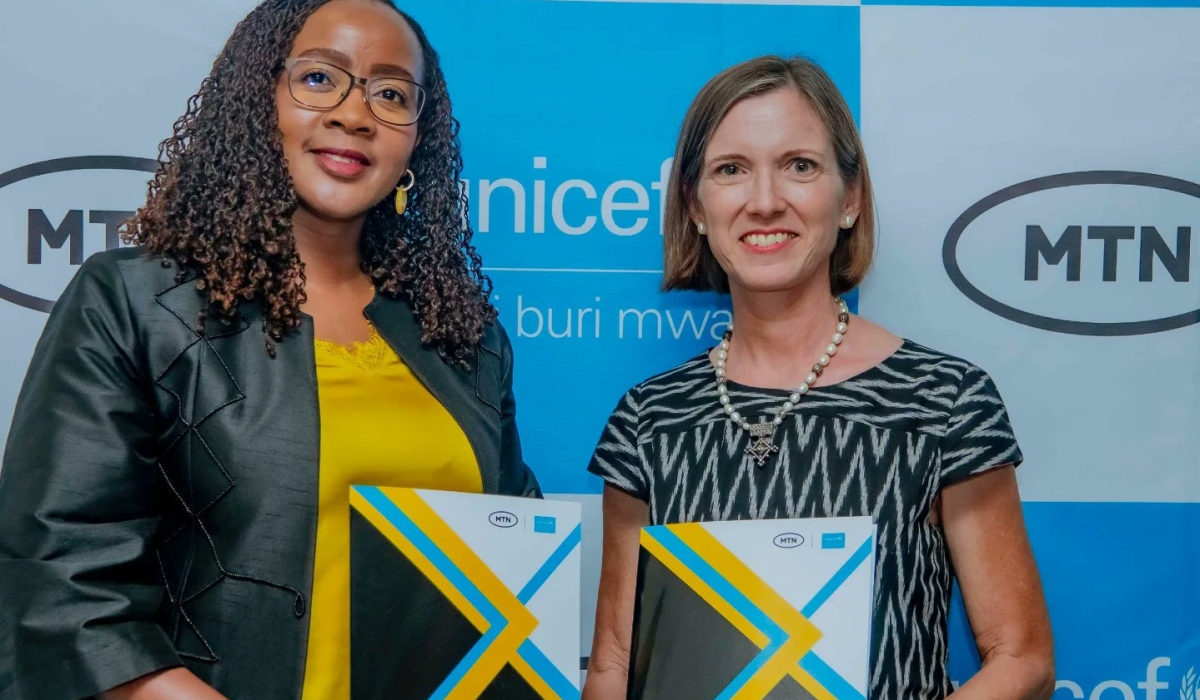 MTN Rwanda CEO Mapula Bodipe and UNICEF Country Representative Julianna Lindsey during the signing of the agreement at MTN’s headquarters in Kigali on December 12. Courtesy