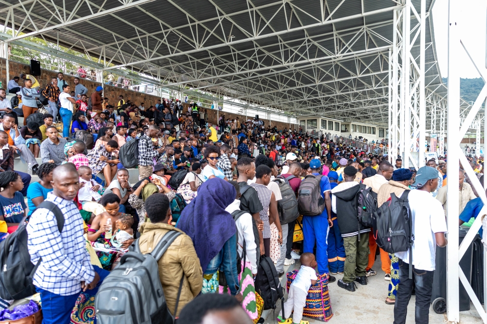 Thousands of travellers turn up to board buses to join their families upcountry for festive season celebrations, on Christmas Eve. Many were left stranded at Kigali Pelé Stadium as they tried to find buses to head to upcountry destinations in the southern parts of the country. Photo: Craish Bahizi.