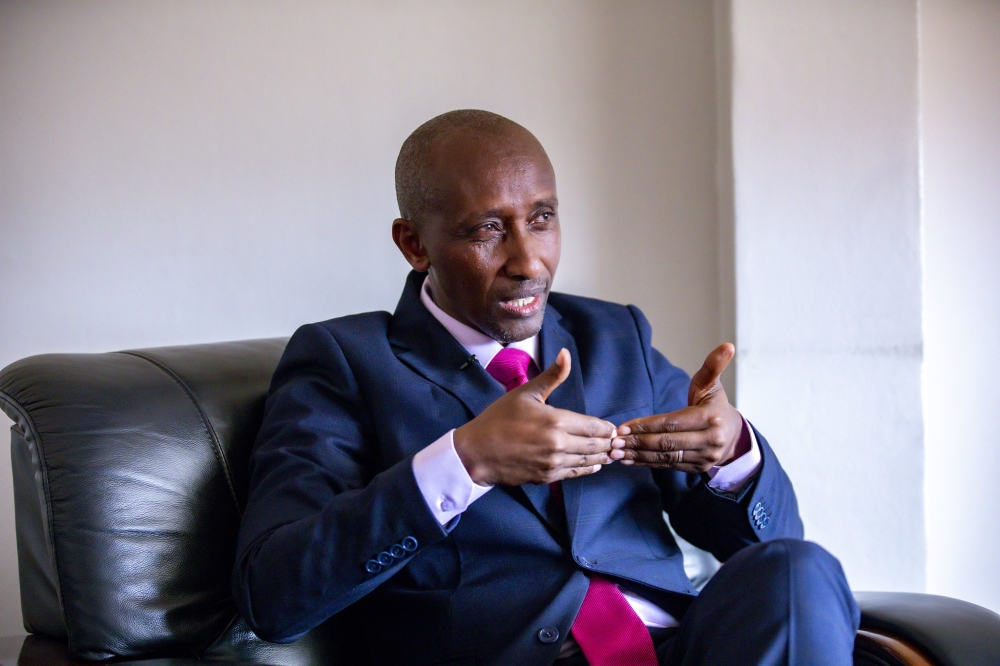 Pastor Frank Karemera of New Life Bible Church speaks to journalists  in Gatenga, Kigali, on Christmas Day, December 25. Emmanuel Dushimimana