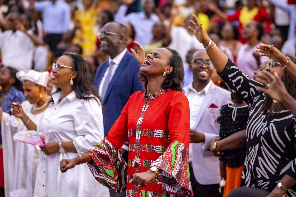 Christians sing during a praise and worship session at Evangelical Restoration Church Masoro on Christimas. Photos by Emmanuel Dushimimana