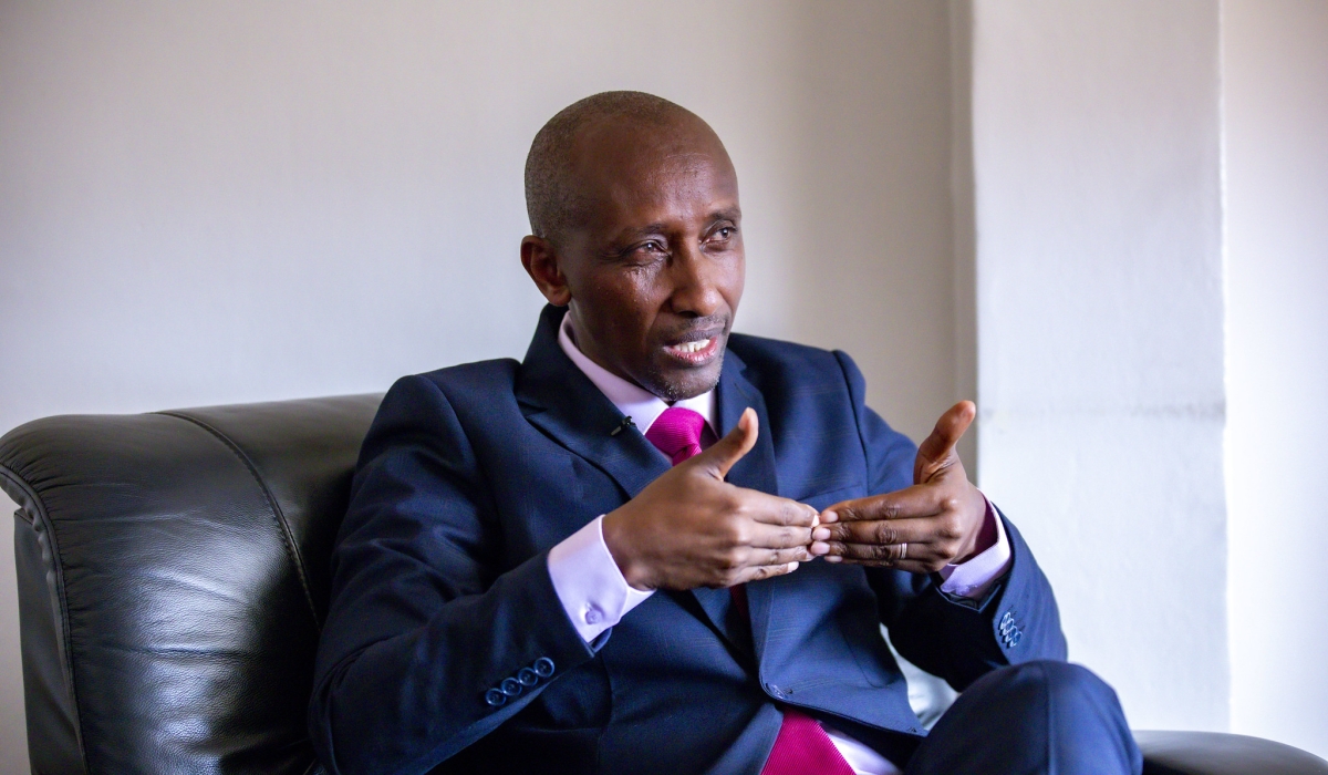 Pastor Frank Karemera of New Life Bible Church speaks to journalists  in Gatenga, Kigali, on Christmas Day, December 25. Emmanuel Dushimimana