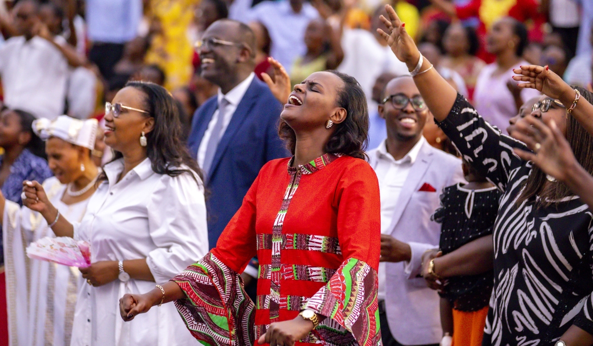 Christians sing during a praise and worship session at Evangelical Restoration Church Masoro on Christimas. Photos by Emmanuel Dushimimana