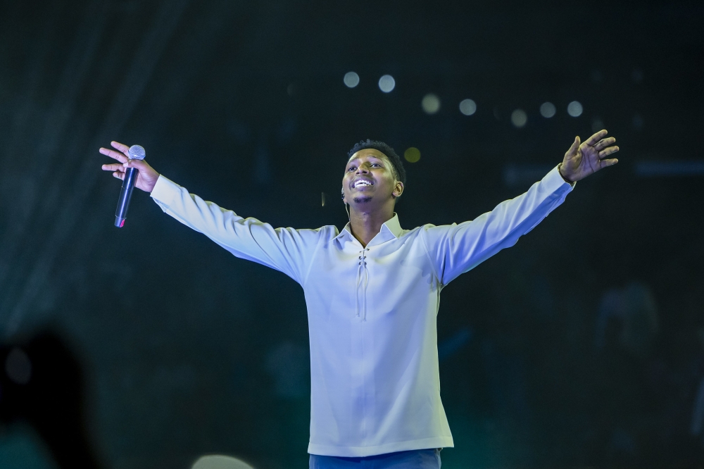 Rwandan gospel artiste Israel Mbonyi during his solo performance at Icyambu Live Concert Season III at the fully packed BK Arena on Christmas Day. Photos by Olivier Mugwiza and Emmanuel Dushimimana