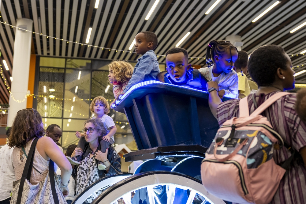 Parents and children enjoy Christmas celebration at Kigali Convention Center. Photo by Craish Bahizi