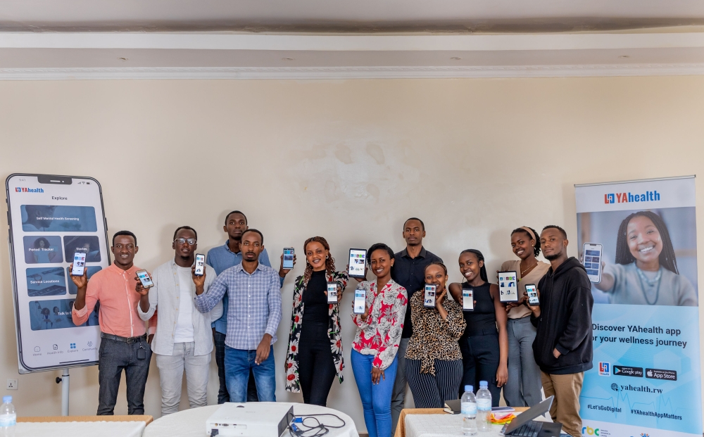 Some participants pose for a group photo at the workshop that brought together the Health Promotion Technical Working Group (T.W.G), different RBC divisions, REB, CSOs, and UN agencies. Courtesy 