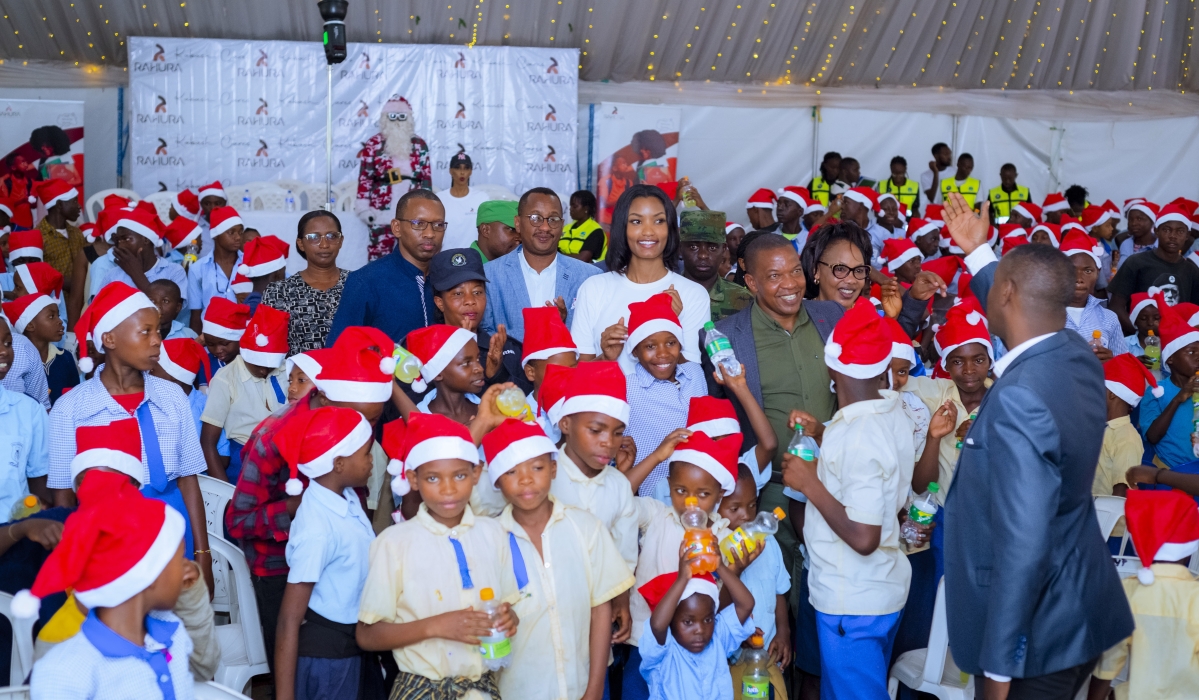 Kate Bashabe, her mother and Kicukiro District Executive Administrator Antoine Mutsinzi and other officials join children to celebrate Christmas-All photos courtesy