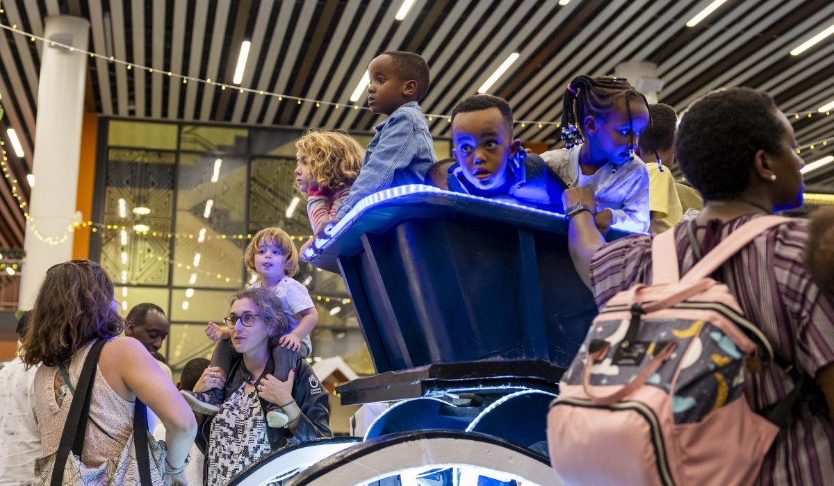 Parents and children enjoy Christmas celebration at Kigali Convention Center. Photo by Craish Bahizi