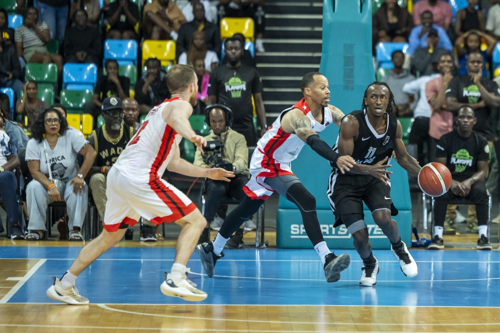 APR BBC&#039;s Nshobizwabyosenumukiza dribbles past Patriots&#039; Kenny Gasana during the league game at BK Arena on September 21, 2024. Olivier Mugwiza