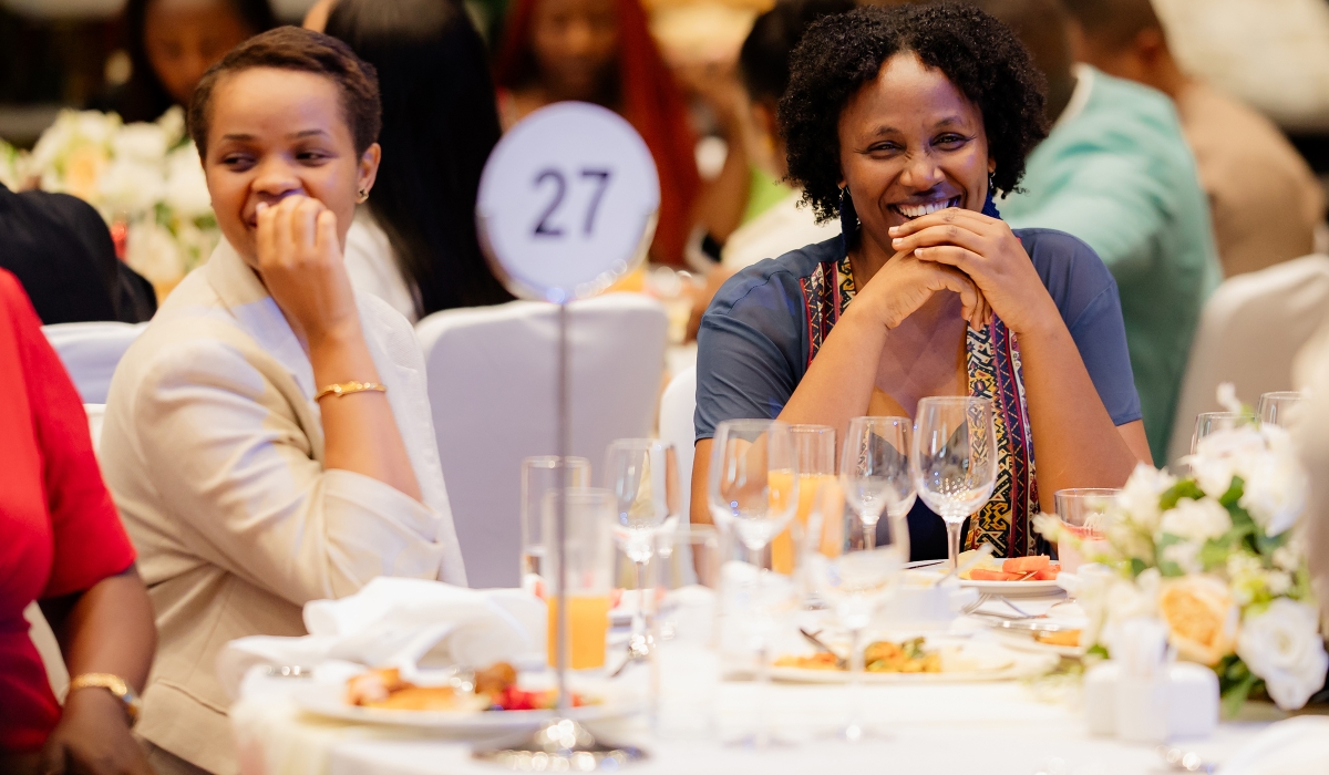 People follow a music band while performing at the gala dinner to celebrate the festive season at Kigali Convention Centre. Photo by Craish Bahizi.