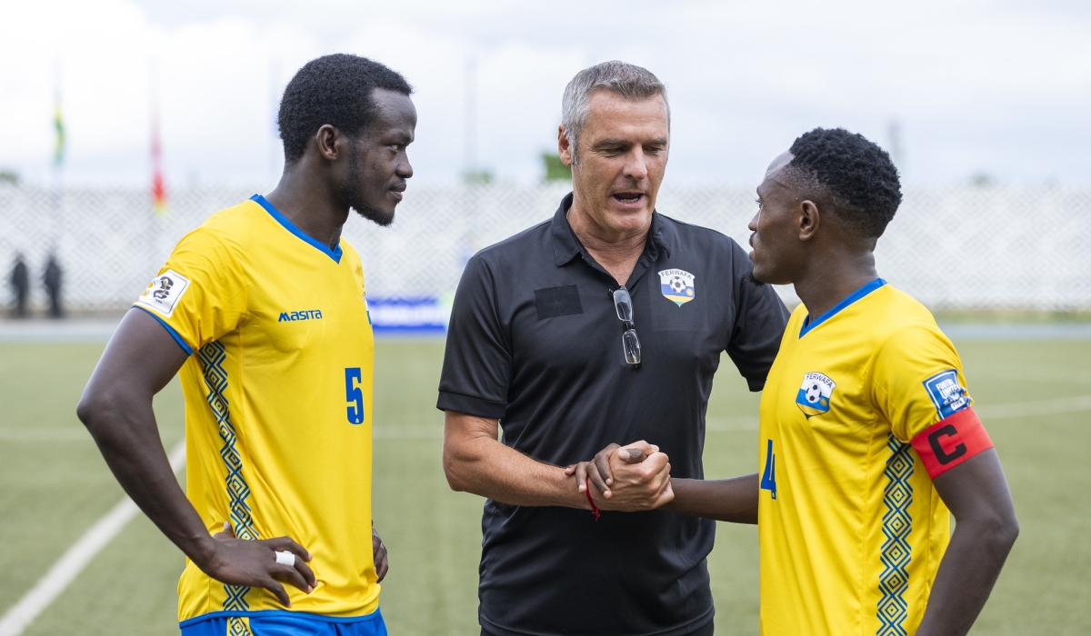 National team head caoch  German tactician Frank Spittler interacts with Djihad Bizimana and Ange Mutsinzi at Huye stadium in 2023. Olivier Mugwiza