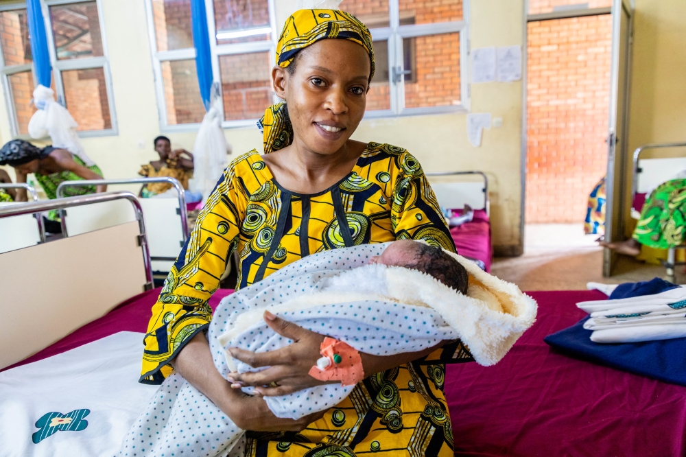 Violette Ahiboneye, 26, gave birth to a baby boy at Kibagabaga hospital on Wednesday, December 25. At least 1,800 babies were born on Christmas and New Year&#039;s Day in Rwanda, according to the Ministry of Health. Photo by Emmanuel Dushimimana