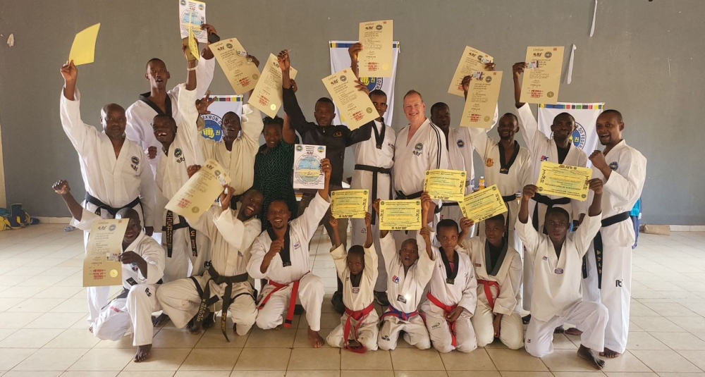 Participants pose for a group photo as  the International Taekwon-Do Federation (ITF) awarded Black Belts to 40 athletes on January 4. Courtesy