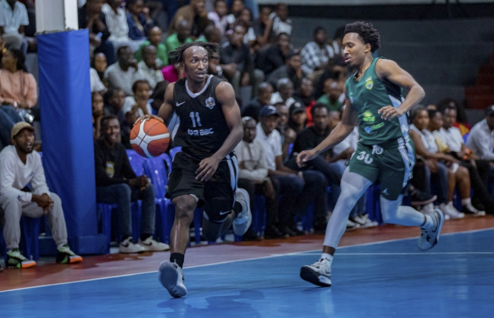 APR BBC&#039;s Nshobizwabyosenumukiza dribbles past Tigers&#039; player during the league game at BK Arena on September 21, 2024. Olivier Mugwiza