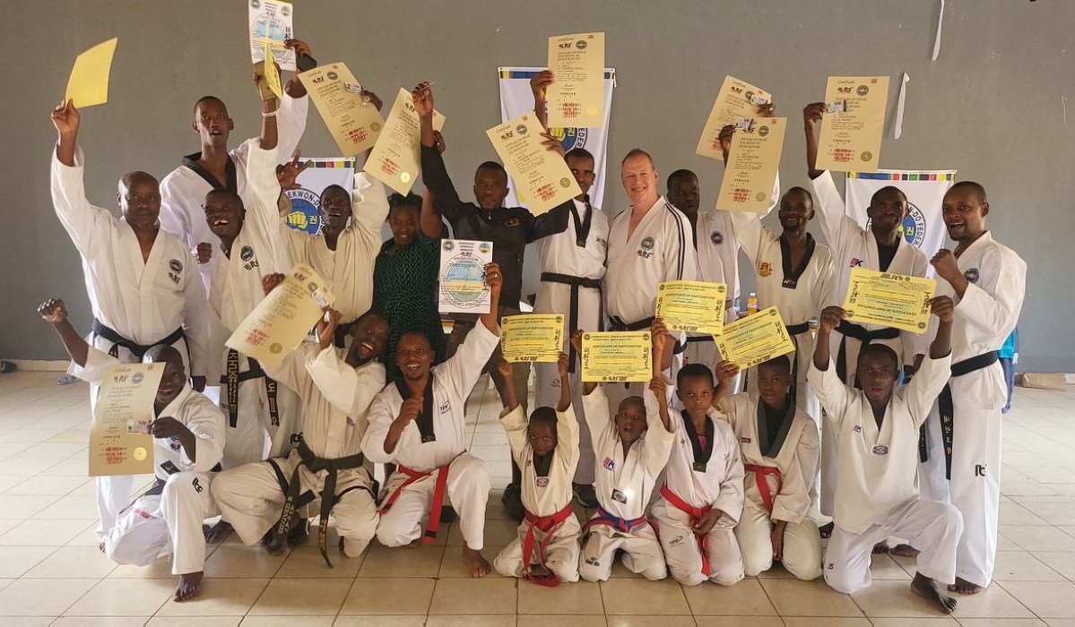 Participants pose for a group photo as  the International Taekwon-Do Federation (ITF) awarded Black Belts to 40 athletes on January 4. Courtesy