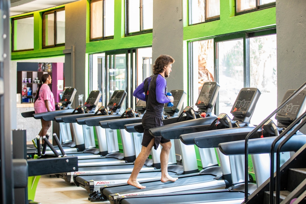 Clients during a fitness session at Fitnesspoint, a fitness and wellness centre, that recently relocated its Nyarutarama branch to a new facility in Remera at former Sports View Hotel. Dan Gatsinzi