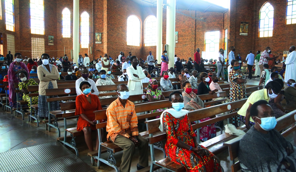 Christians during the  Holy Communion mass at Regina Pacis Catholic church in Kigali on July 19, 2020. Craish Bahizi