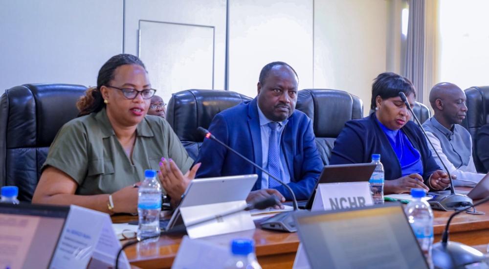 The National Commission for Human Rights  Chairperson Providence Umurungi (Left) addresses members of Parliament on Monday, 6. Courtesy