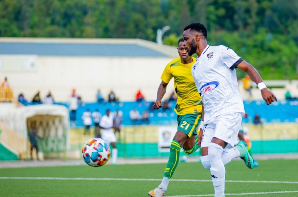 APR FC winger Gilbert Mugisha vies for a ball against a Marines FC opponent during a past match. The par face off on Wednesday, January 8, at Umuganda Stadium-Photo by IGIHE