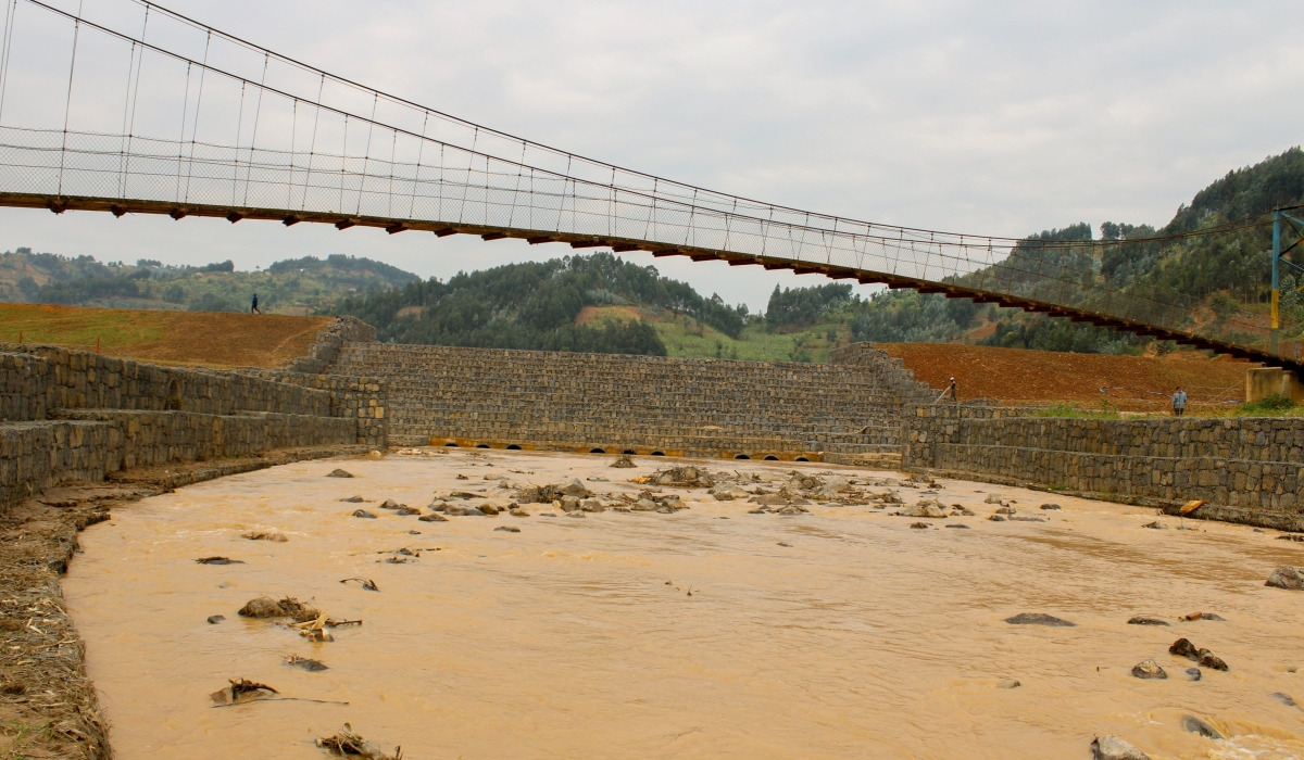 The newly constructed dam  to retain a portion of the floodwater and release it at a controlled flow rate at Sebeya river. Courtesy