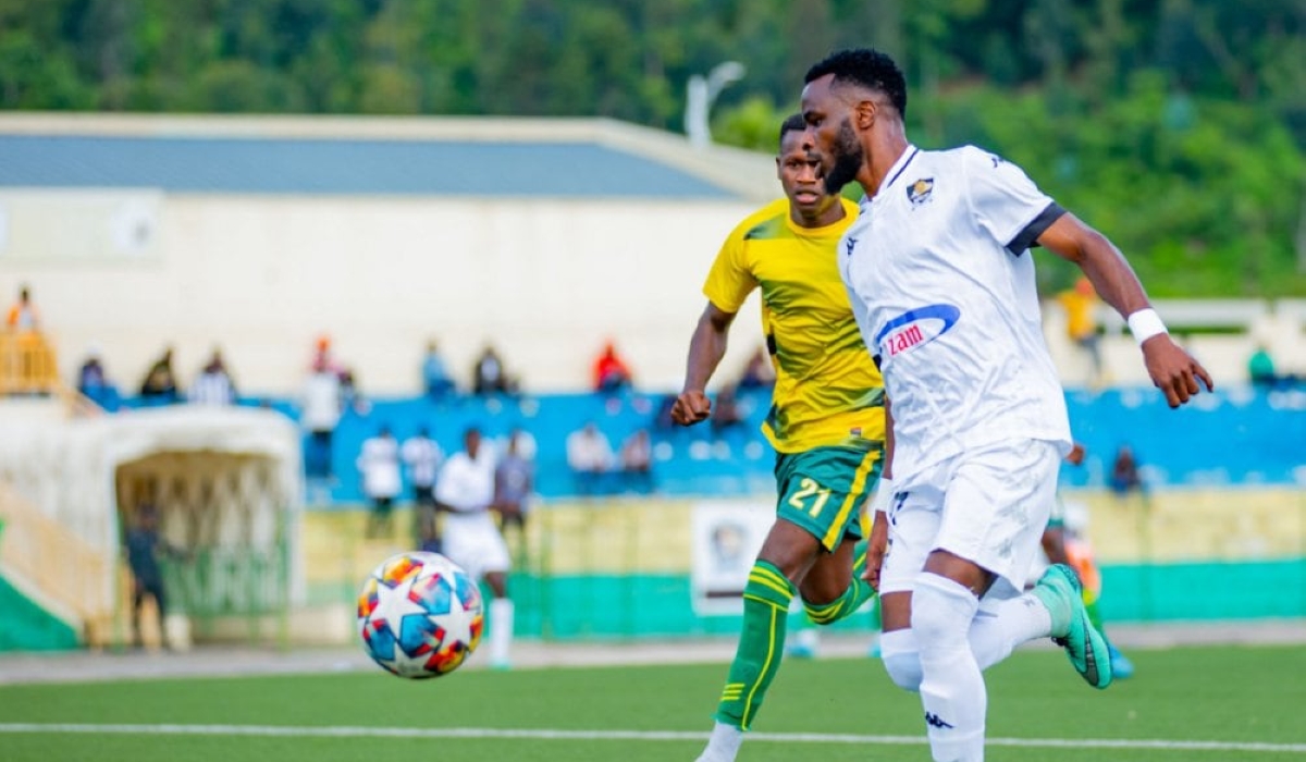 APR FC winger Gilbert Mugisha vies for a ball against a Marines FC opponent during a past match. The par face off on Wednesday, January 8, at Umuganda Stadium-Photo by IGIHE