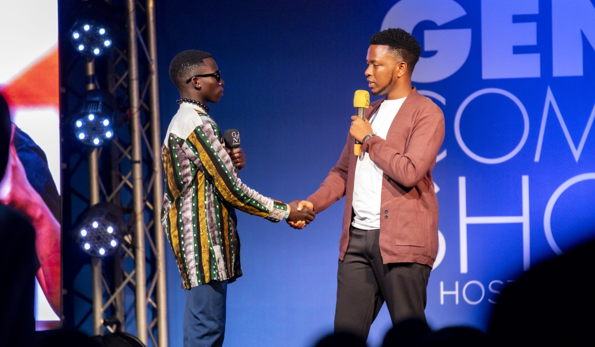 Fally Mercy, the organizer of Gen-Z Comedy, applauds one of the comedians on stage. All photos by Emmanuel Dushimimana