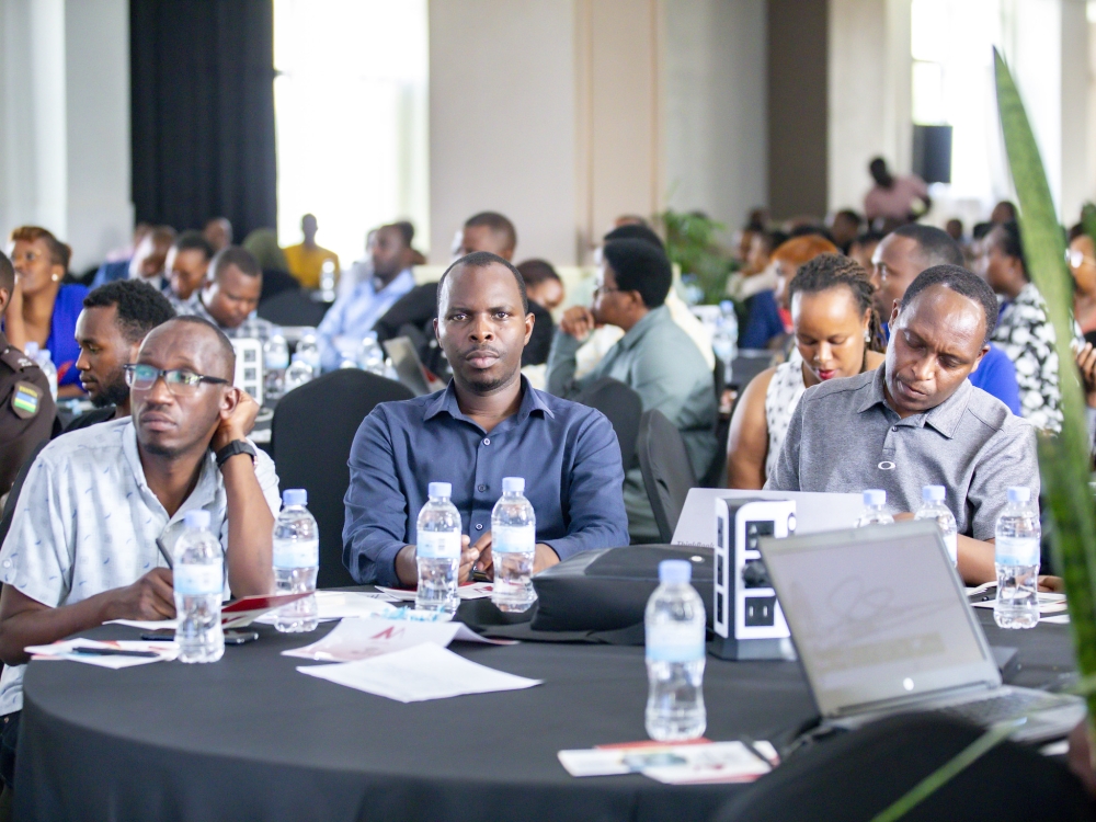 Delegates follow a presentation during a one-day seminar on Friday, January 10. All Photos by Emmanuel Dushimimana