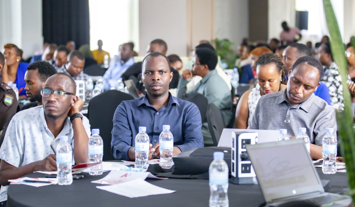 Delegates follow a presentation during a one-day seminar on Friday, January 10. All Photos by Emmanuel Dushimimana