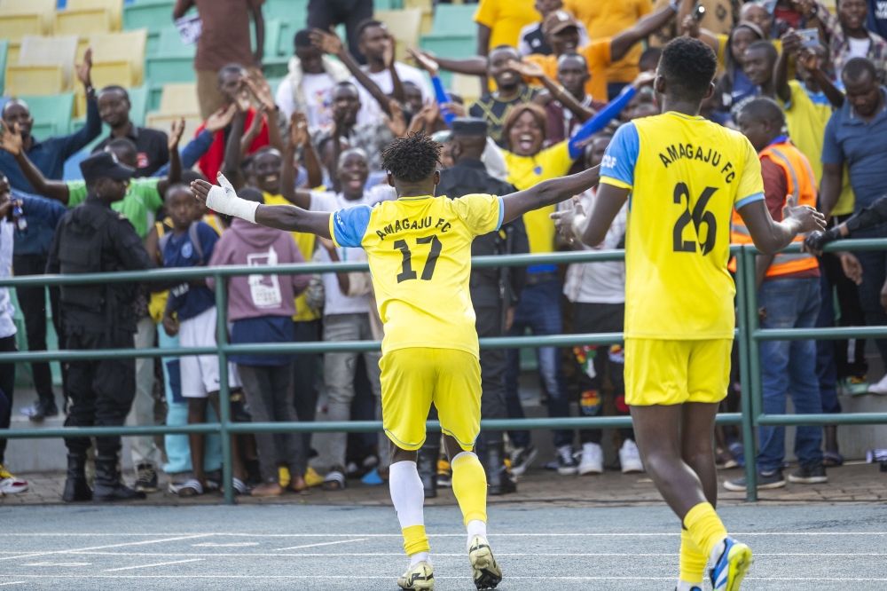 Goalscorer Eduard Ndayishimiye (#17) joins Amagaju FC supporters at fulltime after helping his side beat APR FC 1-0 at Huye Stadium on Sunday, January 12- Photo by Olivier Mugwiza