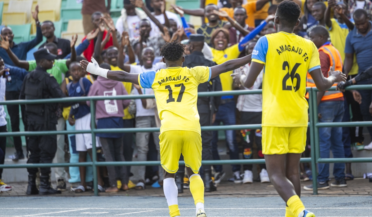 Goalscorer Eduard Ndayishimiye (#17) joins Amagaju FC supporters at fulltime after helping his side beat APR FC 1-0 at Huye Stadium on Sunday, January 12- Photo by Olivier Mugwiza