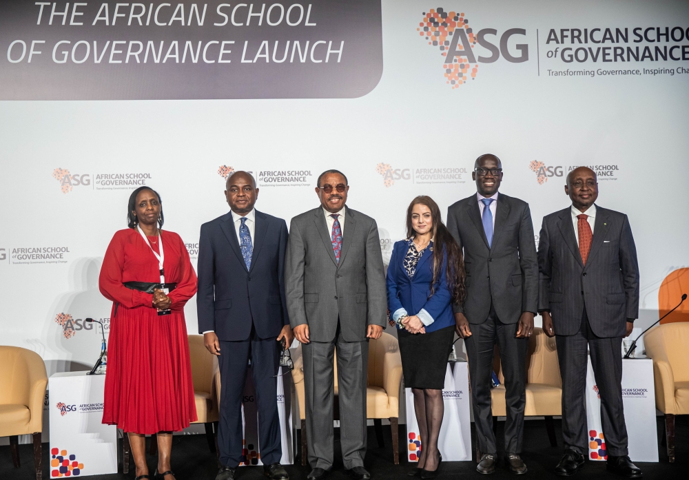 Officials pose for a group photo at the launch of the African School of Governance (ASG) in Kigali on Tuesday, January 14. Photos by Dan Gatsinzi