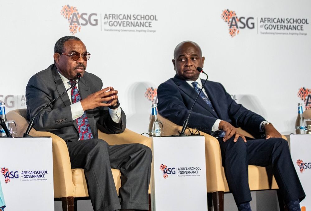 Hailemariam Desalegn, the former Prime Minister of Ethiopia, co-founder of the African School of Governance  and Prof Kingsley Moghalu during the launch in Kigali on January 14. Dan Gatsinzi