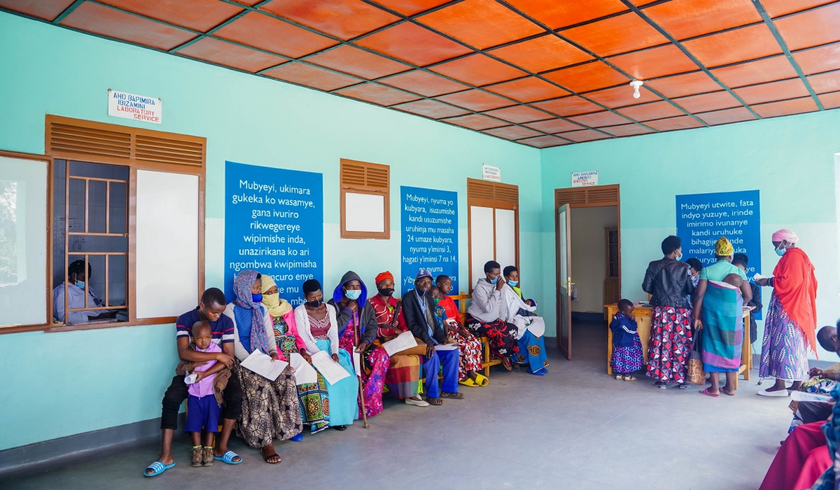 Residents wait for medical services at Gira ubuzima health post in Burera District. Craish Bahizi