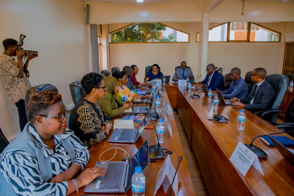 Members of the Lower House’s Committee on Governance and Gender Affairs follow Minister Mugenzi&#039;s presentation.