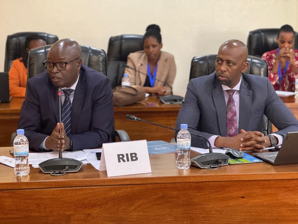 The Rwanda Investigation Bureau  Secretary General, Jeannot Ruhunga addresses members of Parliament on child detention, as RIB Spokesperson Thierry Murangira looks on, on Thursday, January 23. Emmanuel Ntirenganya