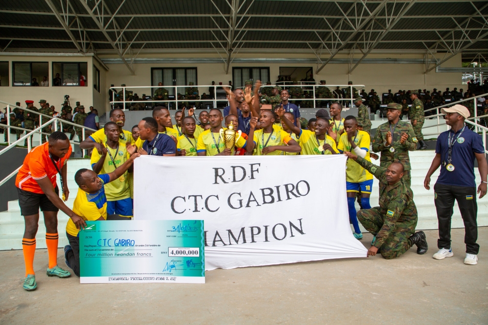 CTC Gabiro celebrate their victory after winning a football trophy at the RDF Inter-Force Sports Competition by beating SOF in the final on Friday, January 31, at Kigali Pele Stadium-courtesy