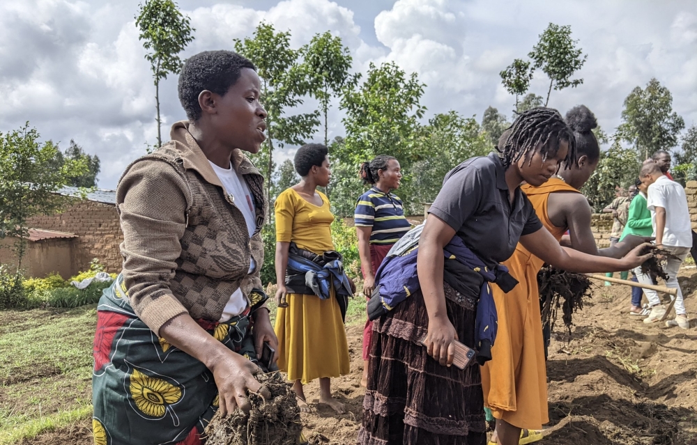 Members of the Dukomeze Ubuzima potato cooperative in Musanze planting crops. Photos by Germain Nsanzimana.