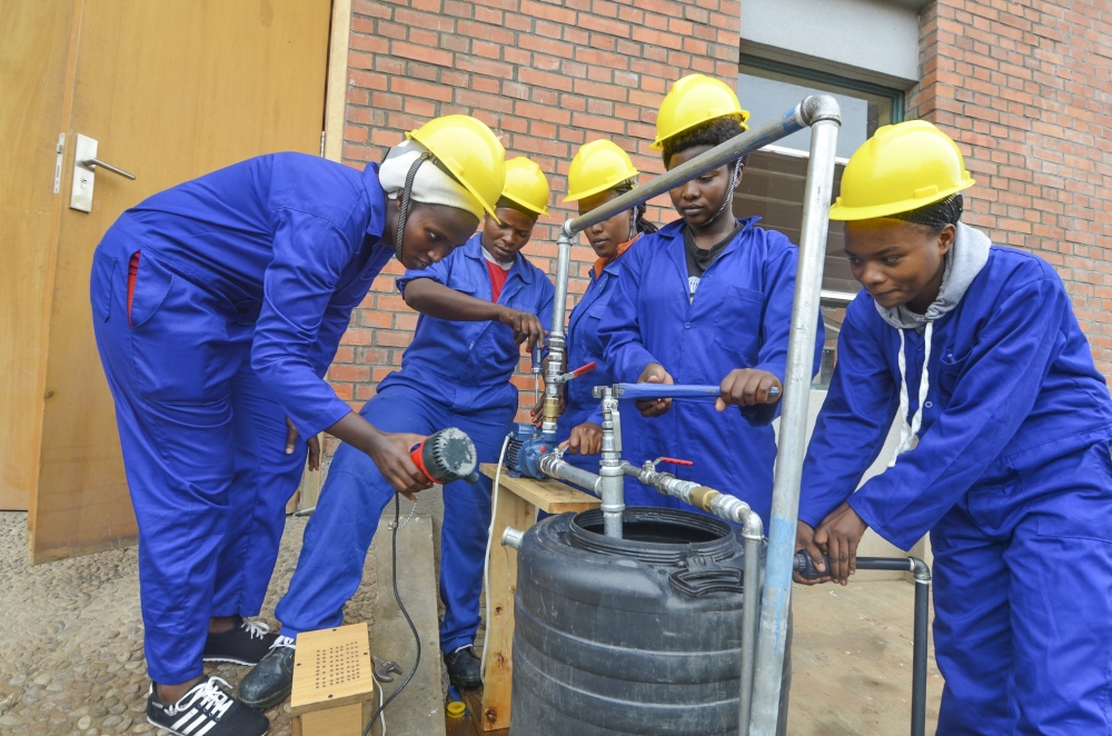 Students during a plumbing exercise at Musanze Polytechnic. The government targets to increase the number of female students in technical and vocational education and training (TVET). Photo by Sam Ngendahimana