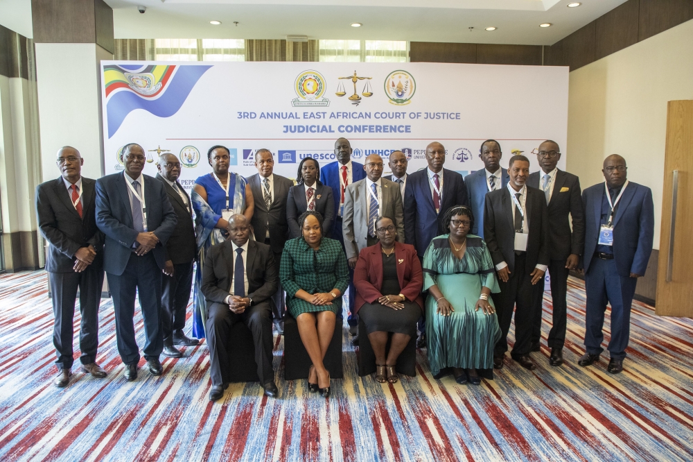 Delegates pose for a group photo at the opening of the Third Annual East African Court of Justice Judicial Conference, in Kigali on February 18. Craish BAHIZI