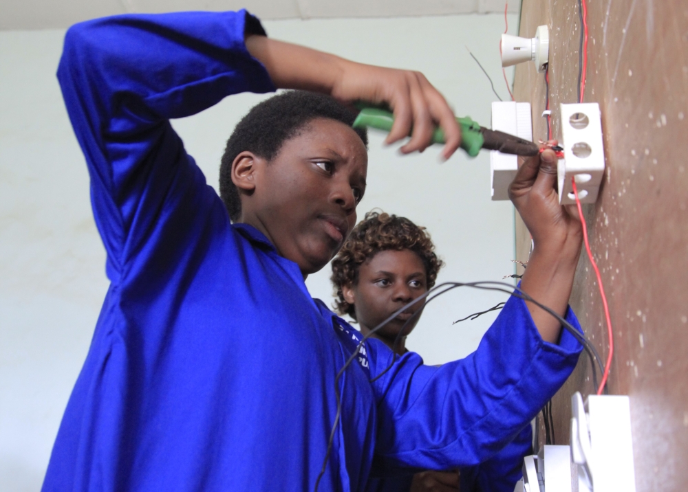 Students during an electrical installation exercise at Musanze Polytechnic. Sam Ngendahimana 