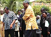 Eriya Kategeya, Ugandau2019s First Deputy Prime Minister (L) and Foreign affairs minister Charles Murigande. Kategaya was part of the delegation of the East African council of ministers who visited Kigali recently. (Photo/ G. Barya)