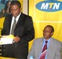 Themba Khumalo (L), MTN Rwanda CEO at the launch of MTN Home and Away at Serena Hotel this month.