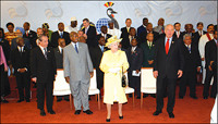 Queen Elizabeth II flanked by President Yoweri Museveni (2nd left) at the International Conference Center Kampala to open the Commonwealth Heads of Government Meeting (Courtesy Photo)